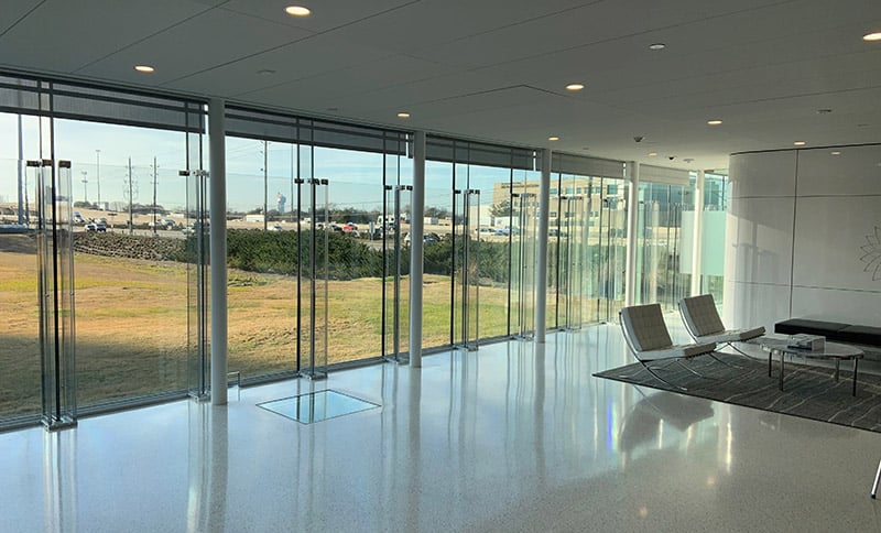 An example of a ballistic glazing retrofit that saves the time and costs of a full bullet proof window replacement while still delivering protection