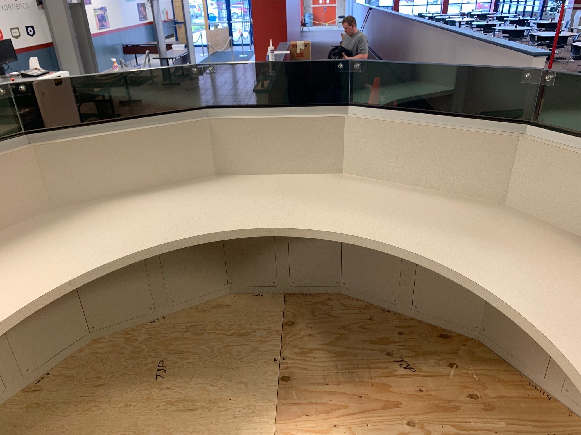 A photo of a countertop in a building that's reinforced with bullet-resistant materials while maintaining the aesthetics of the space