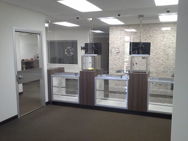 Modern and sleek vestibule with bulletproof door and transaction windows