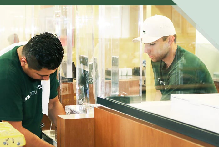 TSS Crew installing barrier 