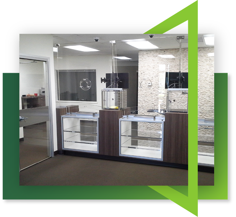 A series of package passers that are incorporated into a building for ballistic resistance