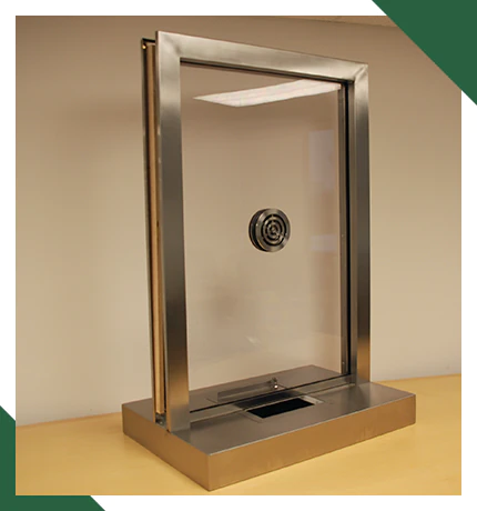 An example of stainless steel framing for a bulletproof transaction window An example of stainless steel framing for a bulletproof transaction window